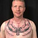 Amusing Pictures ripped from the Net-neck-chest-tattoo-kid-driving-car